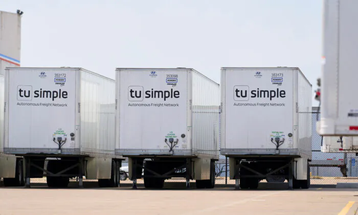 TuSimple truck-trailers are parked at their facility at AllianceTexas, a 27,000 acre business complex boasting some of the country’s largest freight operations, in Fort Worth, Texas, on May 18, 2022. (Cooper Neill/Reuters)